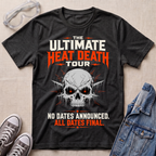 A dark heather gray graphic t-shirt laid flat on a beige fabric background, styled with safety glasses, gray sneakers, and a blue denim jacket. The t-shirt features a skull graphic with glowing red eyes and bold text that reads 'THE ULTIMATE HEAT DEATH TOUR' and 'NO DATES ANNOUNCED.