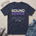 A navy blue graphic t-shirt laid flat on a beige fabric background, styled with safety goggles, gray sneakers, and a denim jacket. The t-shirt features the text 'SOUND ADVICE' in white and purple, above a white sound wave and the formula v = fϗϙ.